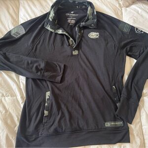 Colosseum Black Polo with Camouflage Details Gators University of Florida
